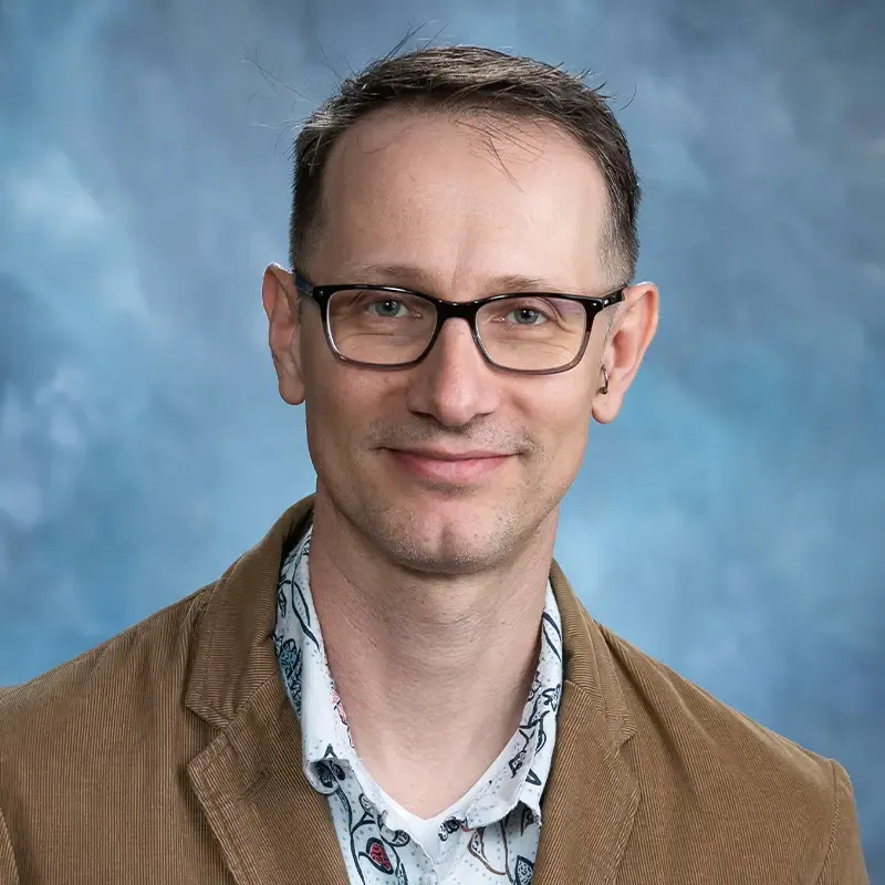 Headshot of Christopher Reno